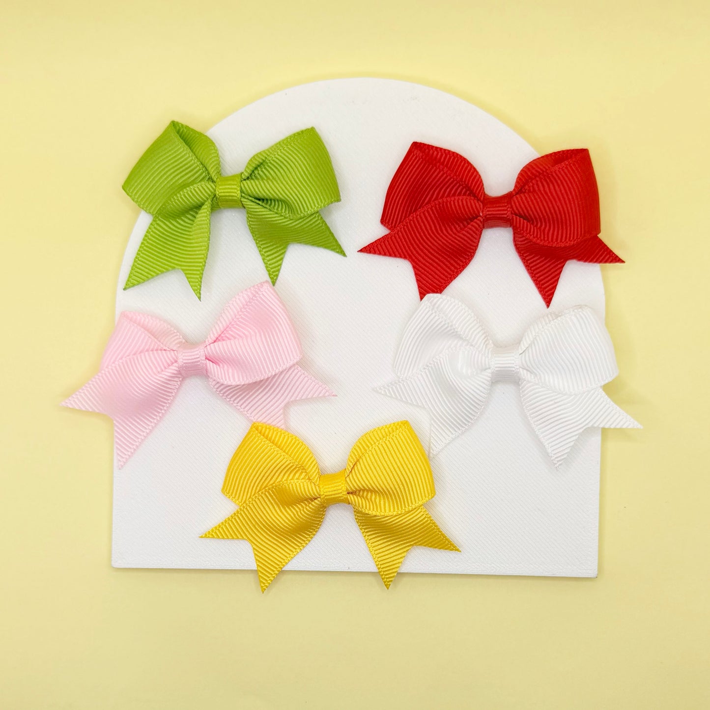 Fabric Hair Bows Set of 10 – flat lay of full rainbow set by Twisty Locks