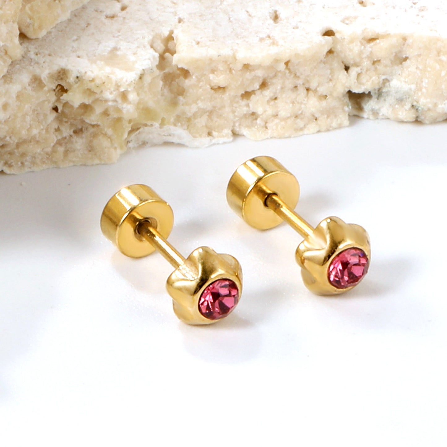 Ruby Flower gold earrings flat lay – poke free children's earrings by Twisty Locks