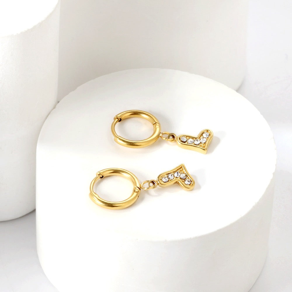 Sparkling Heart Hoops flat lay – poke free children's earrings by Twisty Locks