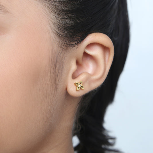Girl wearing Sparkle Flower gold earrings – kids jewellery by Twisty Locks