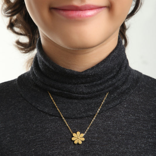 Gold Daisy kids necklace on model – gold jewellery for little ones by Twisty Locks