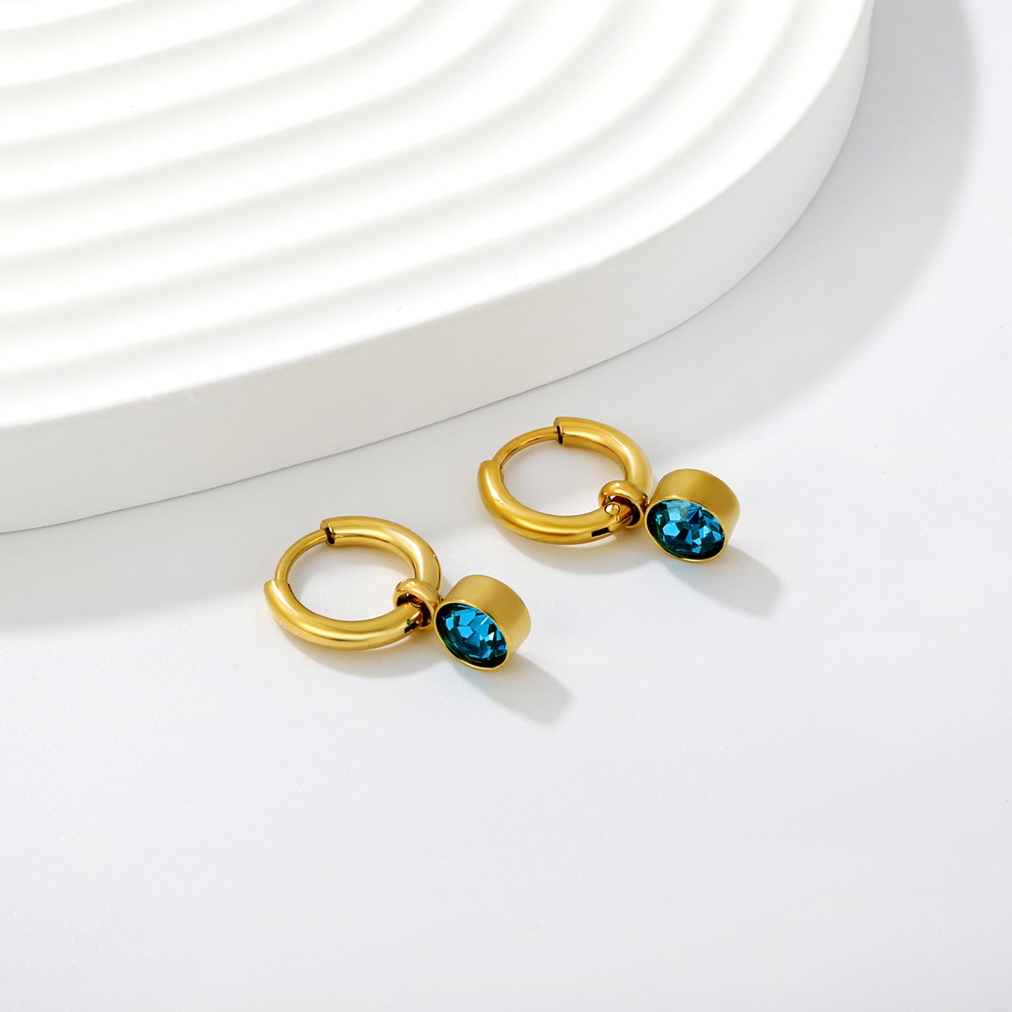 Aquamarine Charm Hoops flat lay – 18K gold plated by Twisty Locks