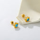 Aqua Flower gold earrings flat lay – 18K gold plated by Twisty Locks