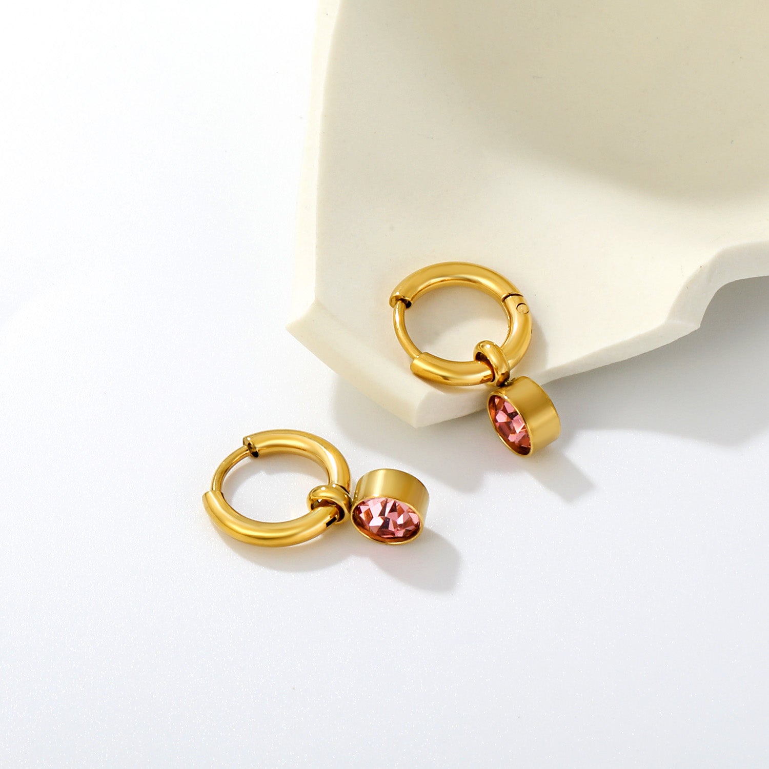 Light Rose Charm Hoops flat lay – 18K gold plated by Twisty Locks