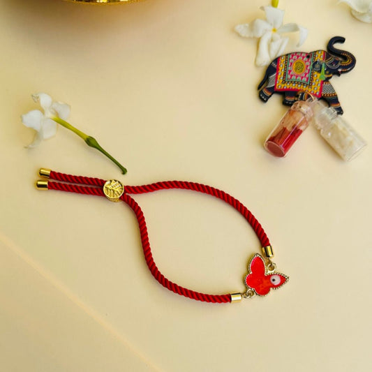 Butterfly Evil Eye Rakhi with Roli & Chawal - Red - Twisty Locks  - Kids Hair Accessories India