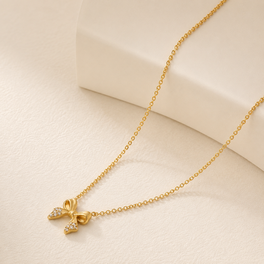 Pavé Bow CZ necklace close-up – anti-tarnish sparkle bow pendant by Twisty Locks