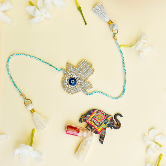 Hamsa Evil Eye Rakhi with Roli & Chawal - Blue - Twisty Locks  - Kids Hair Accessories India