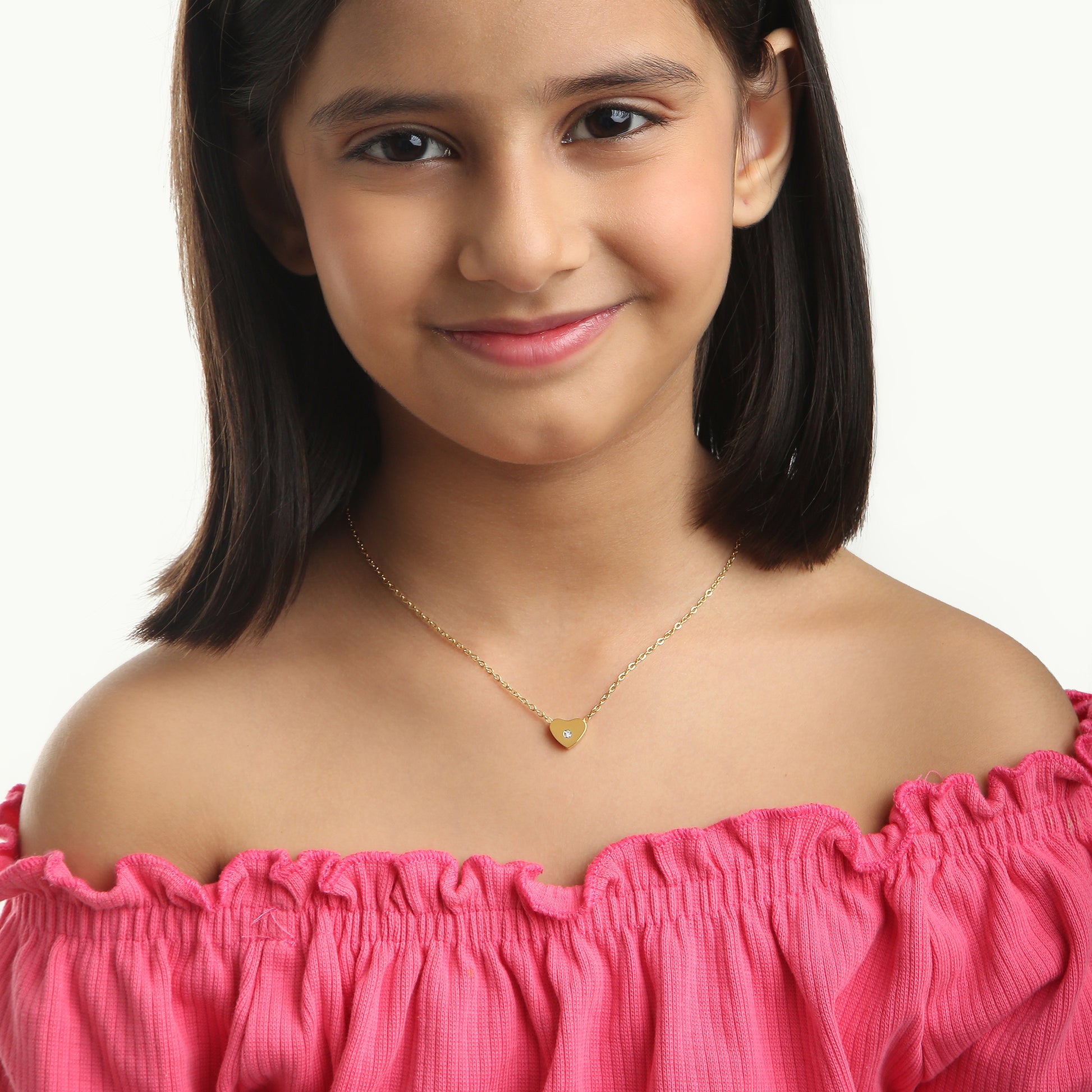 Sparkle Heart children's necklace lifestyle – delicate gold necklace by Twisty Locks
