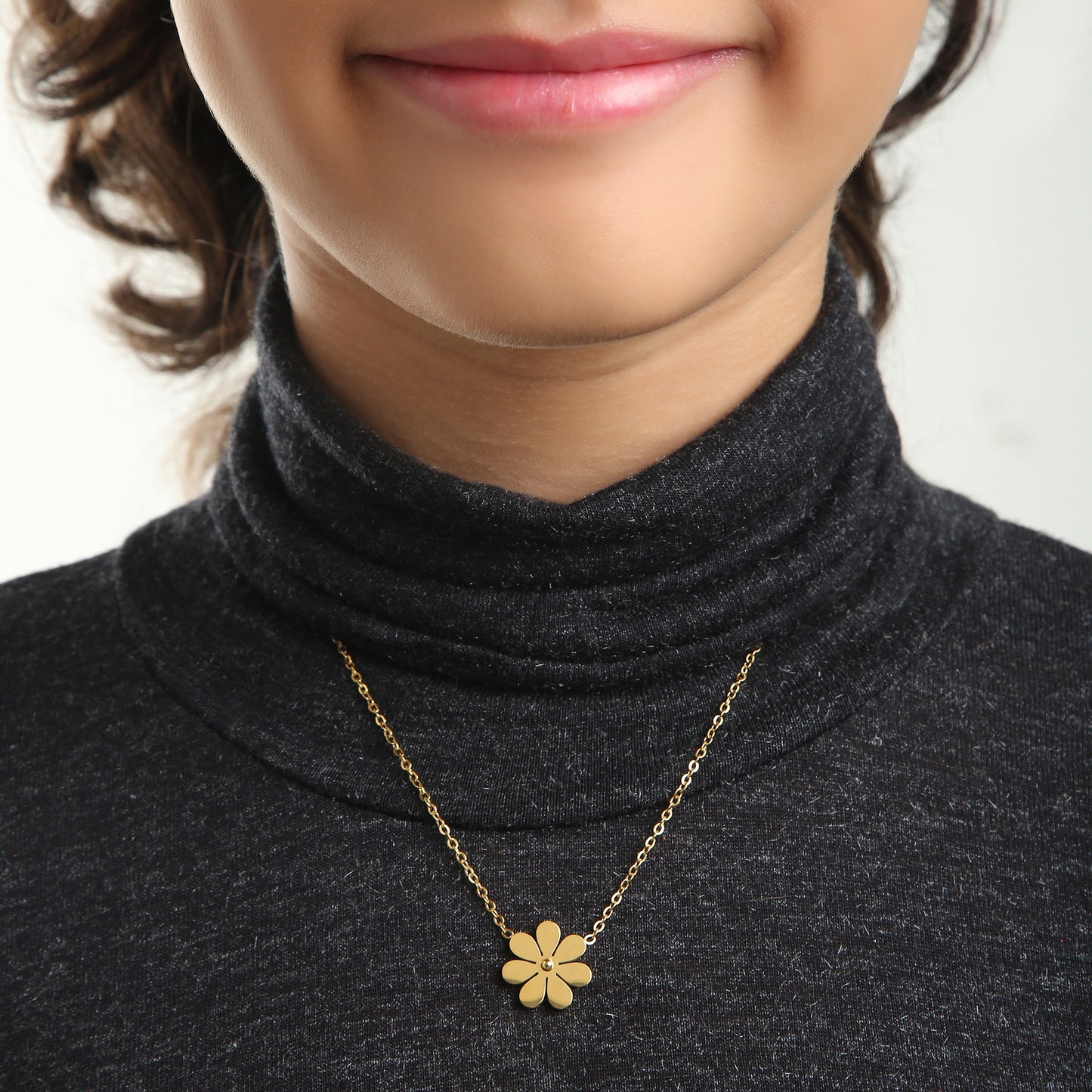 Gold Daisy kids necklace on model – gold jewellery for little ones by Twisty Locks