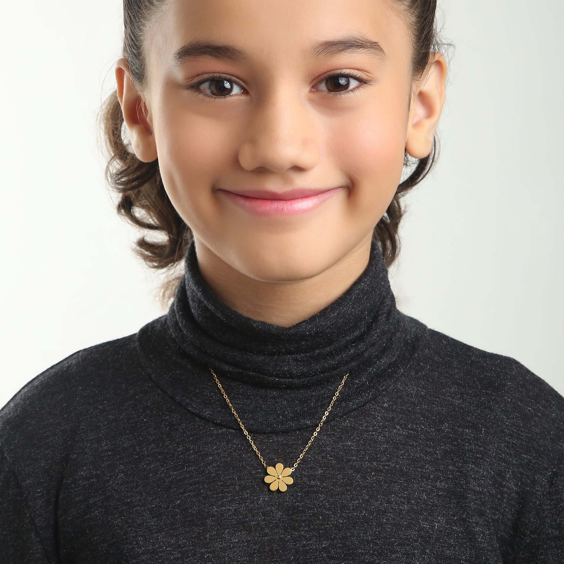 Gold Daisy children's necklace lifestyle – delicate gold necklace by Twisty Locks